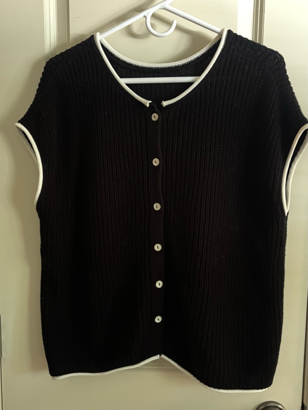 Black Sleeveless Button-Front Knit Sweater with White Trim